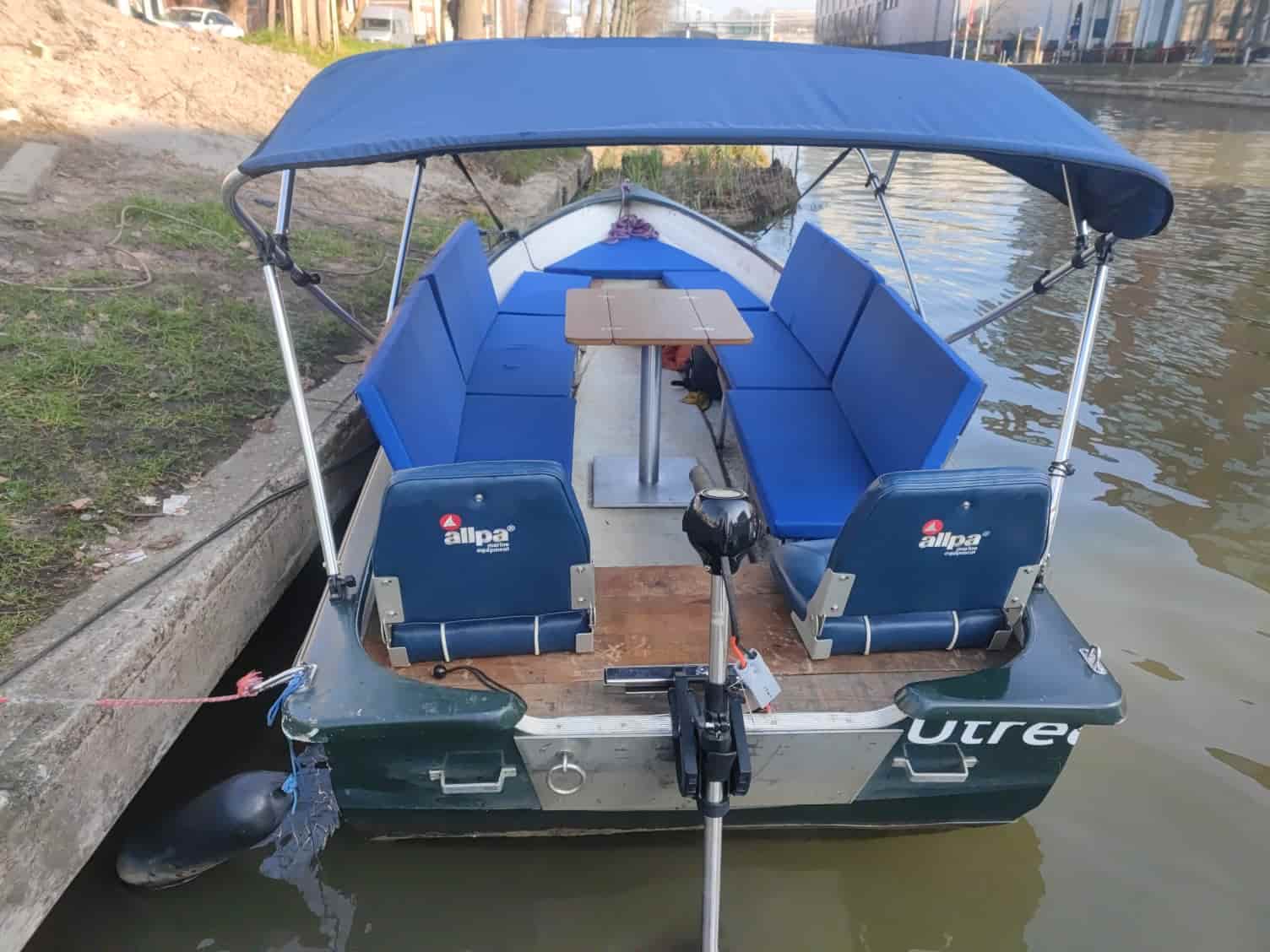 The boat with its bimini sunshade partially open
