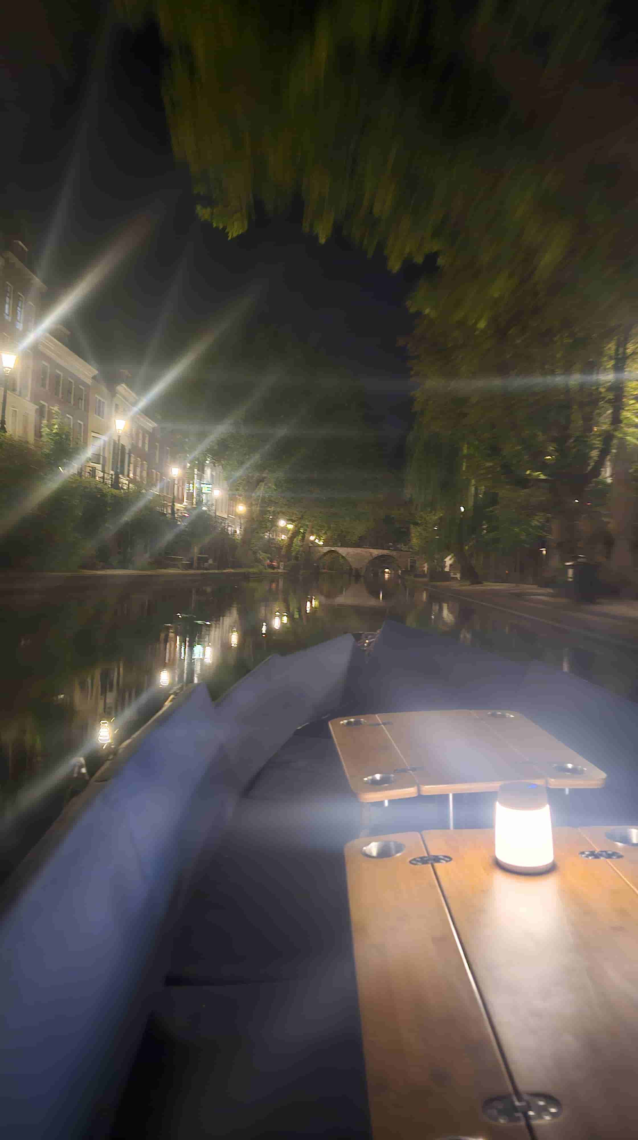 Illuminated bridges reflecting in the canal water at night