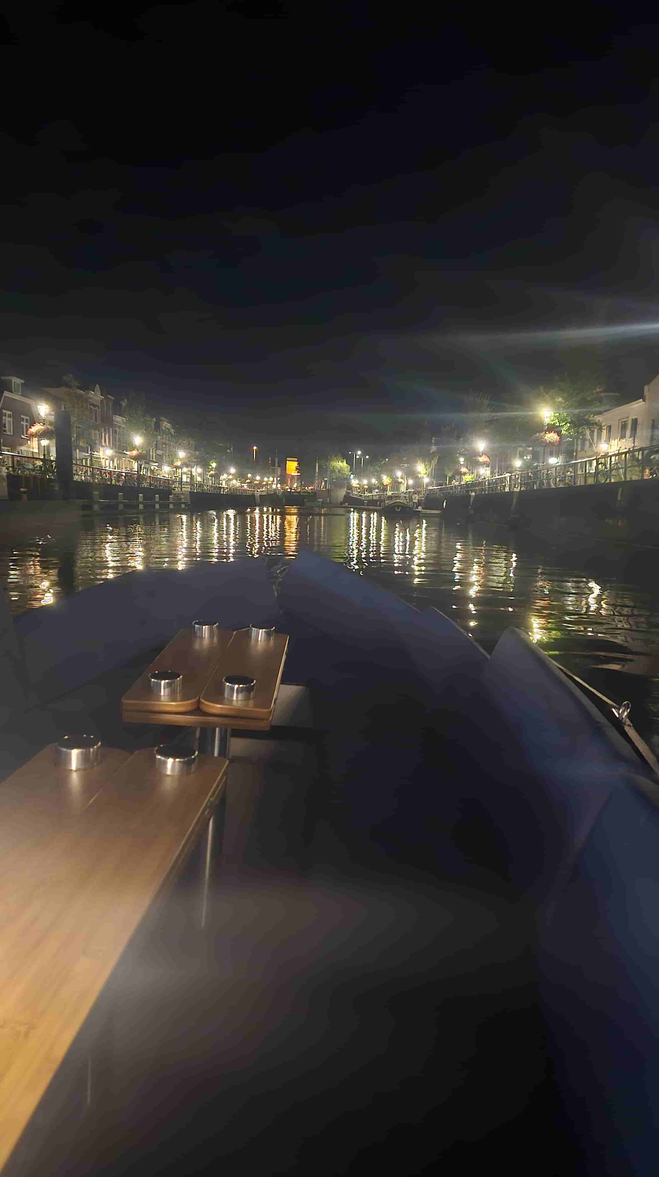 The boat moored at the Oosterkade in the evening